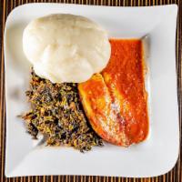 Efo Riro/Spinach Stew · Spinach cooked in red stew and flavored with smoked crayfish, smoked fish, and smoked turkey.