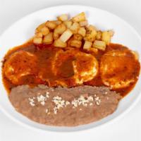 Huevos Rancheros · Served with beans and potato breakfast. Eggs with salsa roja or verde and flour or corn tort...
