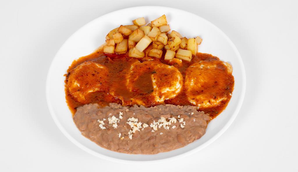 Huevos Rancheros · Served with beans and potato breakfast. Eggs with salsa roja or verde and flour or corn tortilla option.