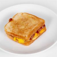 Sandwich · With eggs and mozzarella cheese. Choice of potato, chorizo, bacon, sausage, ham, or beans.