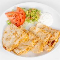 Quesadilla · Melted white and yellow cheese with any of your choice of meat. Served with a side of lettuc...