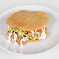 Gordita · Filled with beans your choice of meat and lettuce, tomato, sour cream, and cheese.
