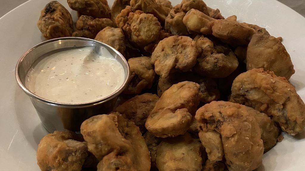 Fried Mushrooms · Sliced mushrooms hand battered and deep fried. Served with house made buttermilk ranch.