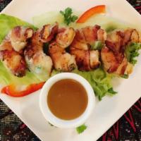 Shrimp Diablitos · Five pan-fried shrimp wrapped in bacon, with a slice of serrano pepper. Served with habanero...