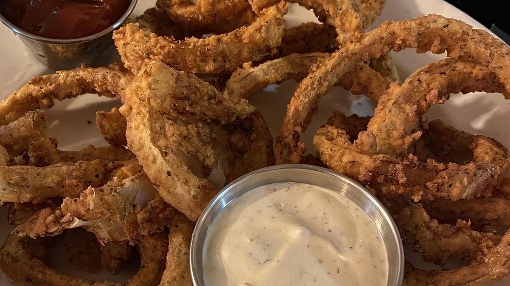 Onion Rings · Hand-cut and hand-battered onions. Served with our house buttermilk ranch dressing or ketchup.