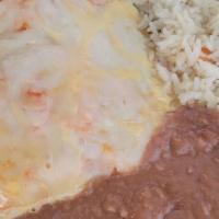 Brisket Enchiladas · Two cherry wood smoked brisket enchiladas, topped with our chipotle sauce and drizzled with ...