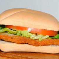 Milanesa Sandwich · Beef or Chicken milanesa, tomato , lettuce,onions, hard boiled egg, mayo. homemade picantina...