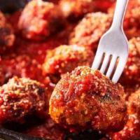 Meatballs · Meatballs in marinara sauce.