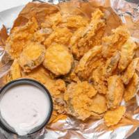 Fried Pickles · Crispy golden fried pickles. served with homemade ranch.