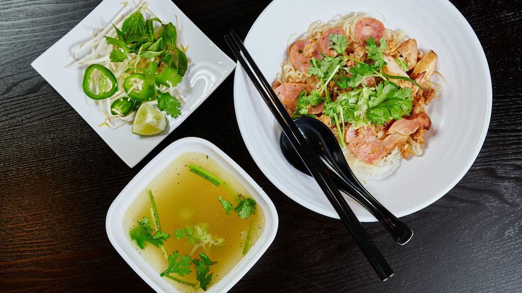 2-Bowl Pho · Ground pork, grilled chicken, lemongrass pork patty, and house special sauce. Rice noodles with onions, lime wedge, bean sprouts, jalapeño, fresh herbs. One large size. Broth is packed separately and does not need to be combined with rice noodles for this dish.