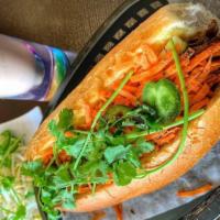 Pork Belly Banh Mi · Braised pork belly with special house sauce. Choice of fresh roll with house mayonnaise, pic...