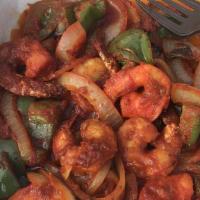Tandoori Prawns · Jumbo prawns in a tangy pepper masala.