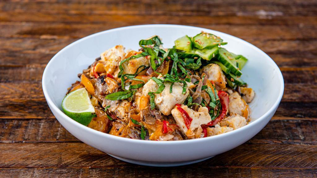 Sesame Tofu Bowl · Sesame tofu with creamy sesame sauce, peppers & onions, sauteed mushrooms, marinated cucumbers,  basil, sesame seeds, and chopped peanuts. Served with a lime wedge and a base of your choice. (Gluten-Free & Vegan)