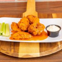 Jumbo Buffalo Wings · We season and bread our wings. Served with celery and choice of ranch or blue cheese dressin...