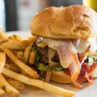 Avvio Burger* · brandt farms grass-fed burger, caramelized onions, Applewood smoked bacon, cheddar cheese, s...