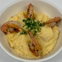 Domain Shrimp & Grits · Our slow simmered grits with with cheese and grilled , blackened shrimp.