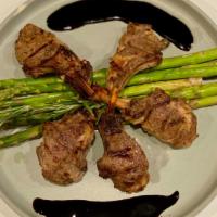 Domain Lamb Lollipops · Four Lamb Chops marinated in herbs, olive oil, and garlic grilled to perfection. Served over...