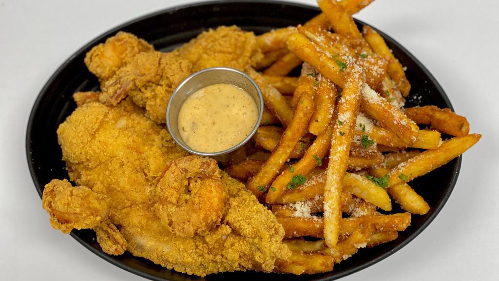 Catfish & Shrimp · Two catfish fillets and four shrimp blackened or fried served with your choice of fries (Flavors: Regular, Cajun, Truffle) and a side of remoulade dipping sauce