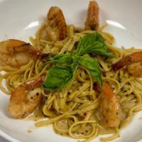 Shrimp Scampi Pasta. · Sautéed shrimp in a white wine and Garlic butter sauce with sliced garlic, fresh squeezed le...