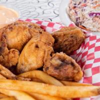 Four Pieces Chicken Combo · Four pieces of our delicious house fried chicken, served with sides that complement it perfe...