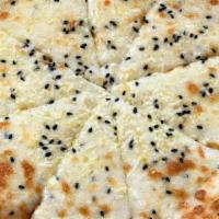 Dual Cheese Pizza · Our in house twist on a well renowned classic, made with Feta cheese, Mozzarella, sesame see...