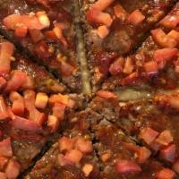 Kafta Pizza · Another in house recipe crafted with ground lamb and beef, onions, tomatoes, parsley, garlic...