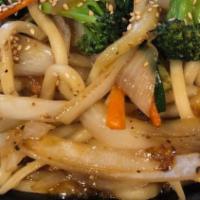 Yaki Udon · Japanese wheat noodles with chicken and vegetables, stir fried with teriyaki sauce.