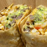 Cali Burrito · Filled with Fries, Extra Steak, Guacamole, Mexican Cheese, and Ranchito Sauce.