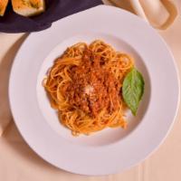 Spaghetti Bolognese · Spaghetti pasta tossed in our classic veal ragu.