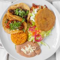 Gordita & 2 Tacos Combo · Thick Handmade Tortilla served with 2 Tacos and Rice and Beans.