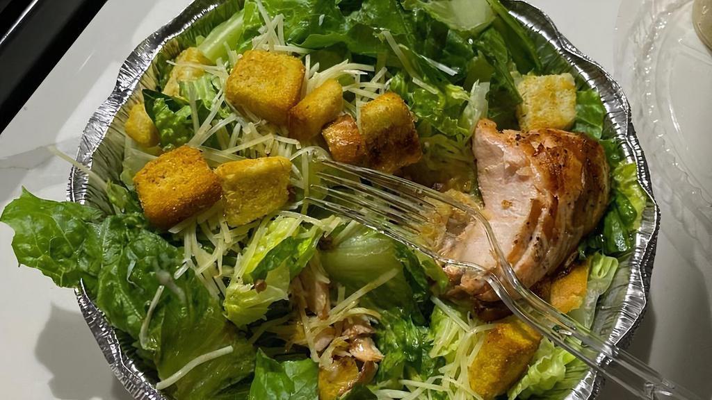 Caesar Salad · Romaine lettuce • hand crafted caesar dressing • herbed croutons  a touch of parmesan