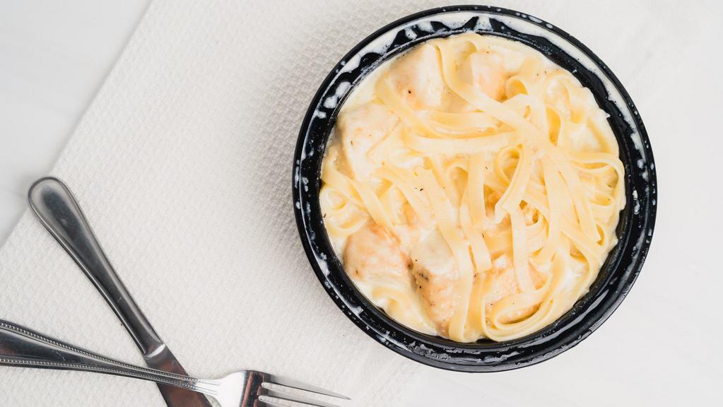 Fettuccine Alfredo · Homemade marriage of cream sauce and pasta
