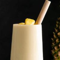 Pina Co-Laada Smoothie · Pineapple, sweet coconut flakes, milk-pineapple juice, and ice blended with your choice of f...