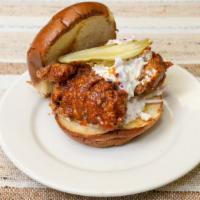 Habanero Chicken Sandwich · Crispy deep fried chicken thigh drizled in our homemade red habanero sauce in fresh bread, w...