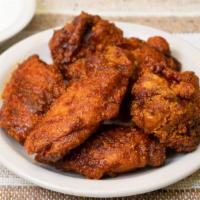 Nashville Wings (6) · Crispy deep fried chicken wings covered in our homemade Nashville sauce