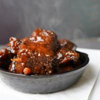 Burnt Ends · Twice Smoked & Seasoned Brisket Caps Tossed in Our Homemade Bbq Sauce