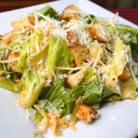 Caesar Salad · Romaine lettuce with croutons, shredded parmesan cheese & Caesar dressing. Add chicken, 4 sh...
