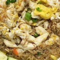 Crab Fried Rice · stir-fried jasmine rice blended with egg, onions, diced mix vegetables, and crab meat.