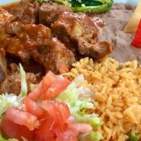 Carne Ranchera · Rice, beans, salad and two tortillas.