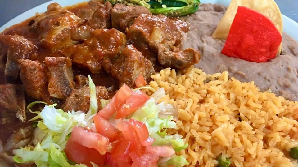 Carne Ranchera · Rice, beans, salad and two tortillas.