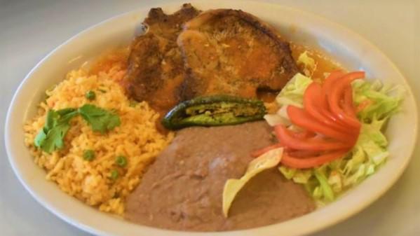 Pork Chops Ranchera · Rice, beans, salad, two tortillas and guacamole.