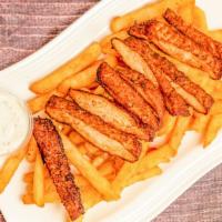 Tender Basket · Seasoned fries topped with chicken cream chop and tzatziki sauce.