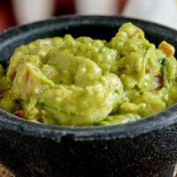 Guacamole · Avocado, diced tomato, red onion, cilantro, Serrano peppers, lime juice.  Served with house ...