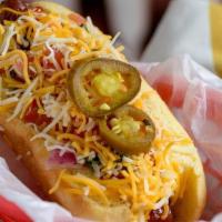 Street Dog · (aka Tijuana Hot Dog) bacon wrapped all beef frank, refried beans, mayo, ketchup, mustard, c...