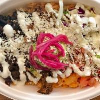 Carnitas Bowl (Pork) · Slow cooked pork over red rice with pico de gallo, black beans, pickled red onion, cabbage, ...