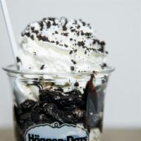 Cookies & Cream Shake · Pieces of crunchy chocolate cookies in vanilla ice cream blended and topped with whipped cre...