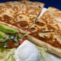 Quesadilla · Delicious crispy flour tortilla filled with Monterey Jack cheese and a protein of your choic...