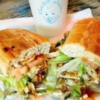 Carved Turkey Sandwich · Oven Roasted Turkey, Picante Provolone, Honey Mustard, cranberry sauce, carrot, cucumber, le...