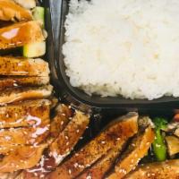 Chicken Teriyaki · Served with white rice steamed mix vegetables sauteed onion and teriyaki sauce.