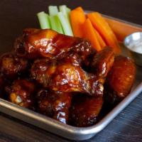 Wings (18) · Celery & carrot sticks, and blue cheese or ranch included. Choose 2 flavors.